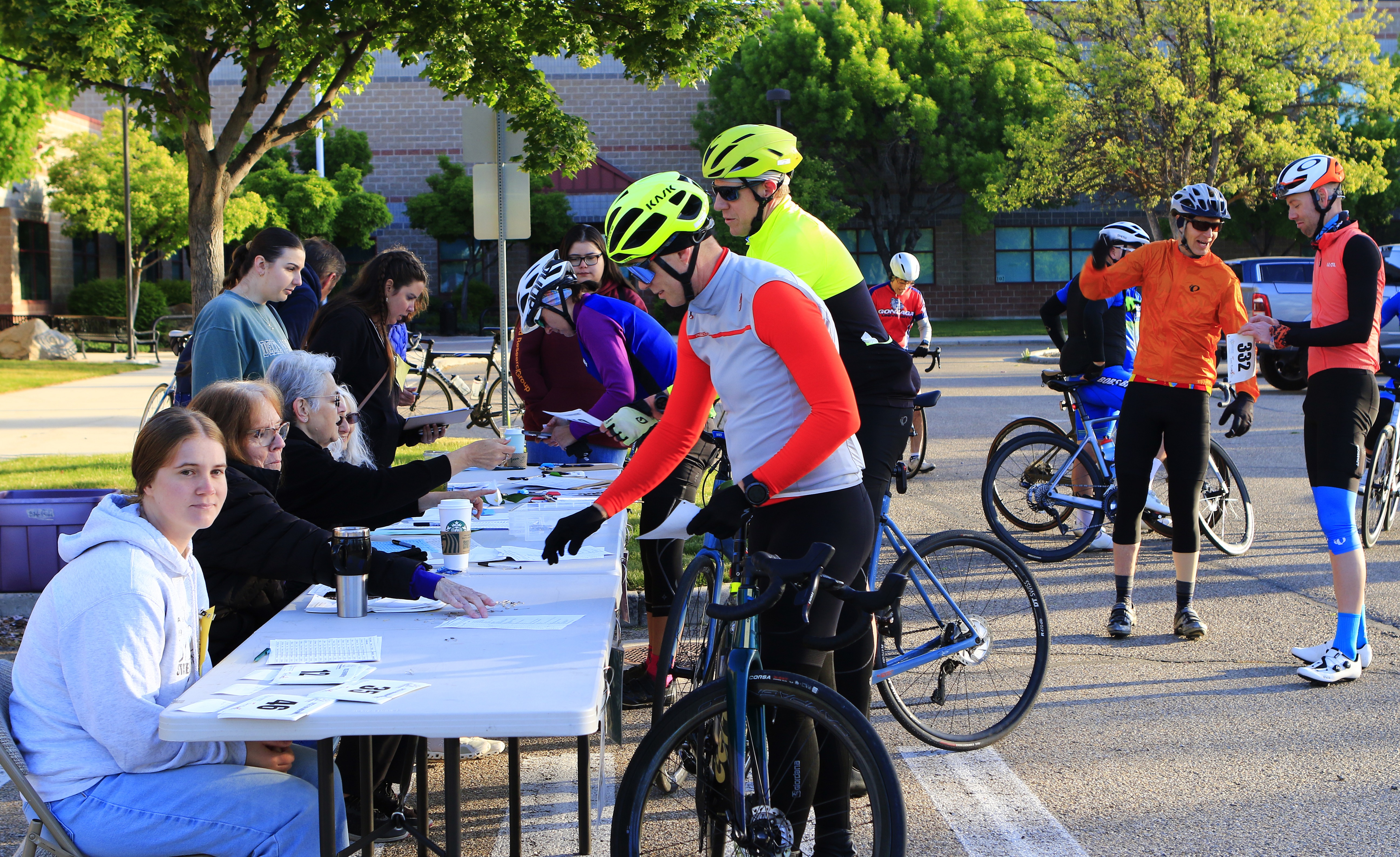 Riders getting their registration packet.